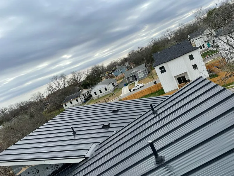 Standing seam metal roof panels with vents for Skylight Repair in Charlottesville